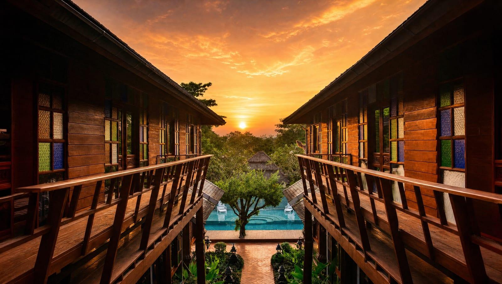 Jintara Rehab pool and gardens at golden hour in Chiang Mai, where dual diagnosis alcohol and antidepressant treatment runs alongside medical detox