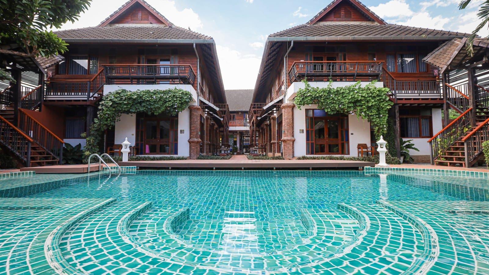 Jintara Rehab compound with pool courtyard in Chiang Mai, Thailand, where family support is structured into the residential treatment program