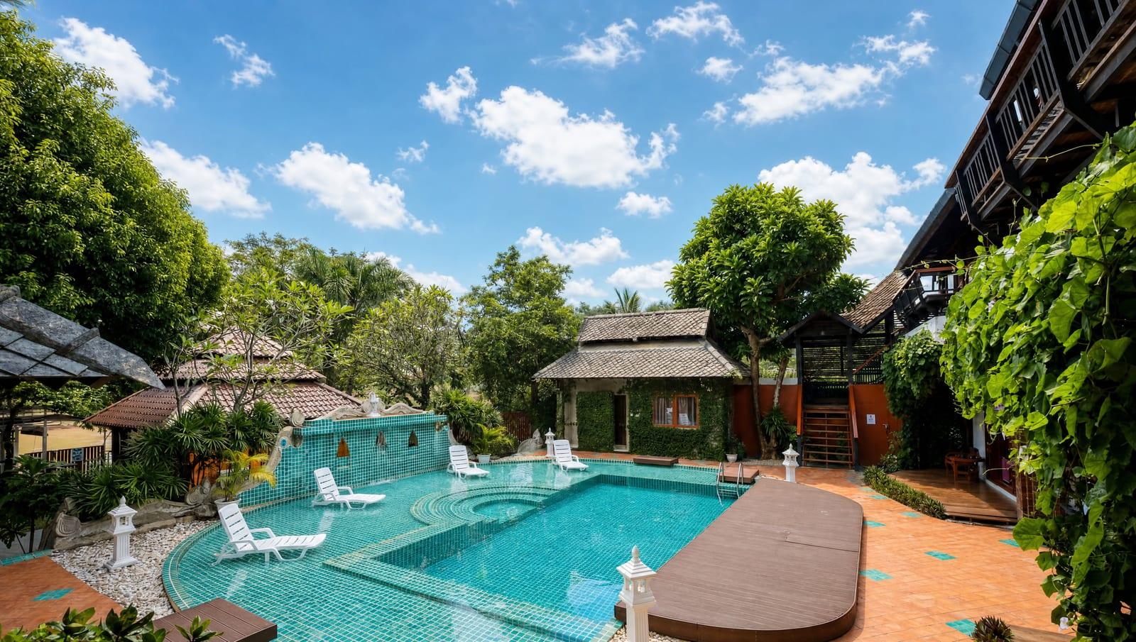 Swimming pool and grounds at Jintara Rehab Chiang Mai, family support addiction treatment