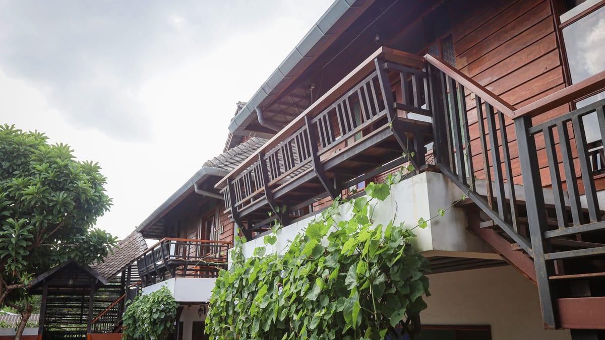 Timber balcony and building exterior at Jintara rehab facility Chiang Mai