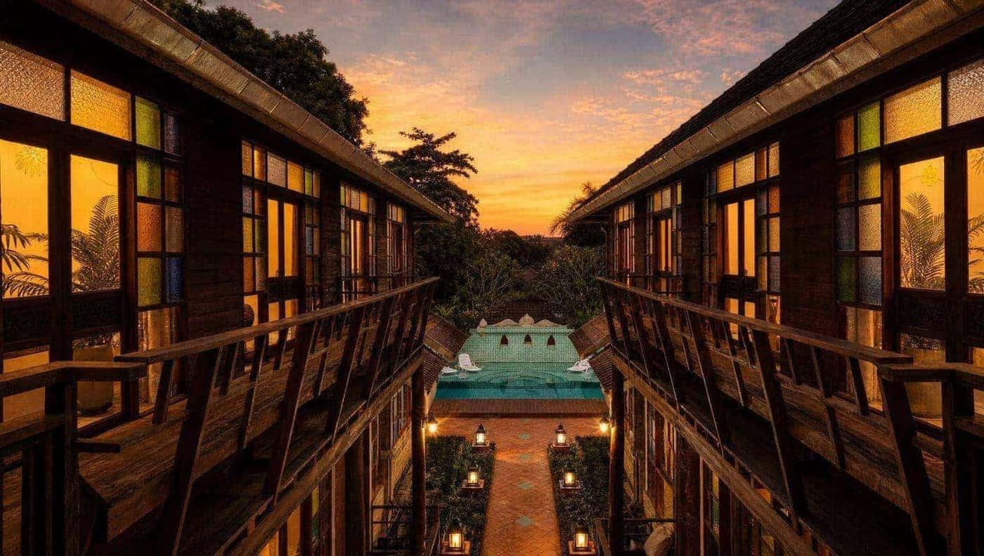 Jintara Rehab compound walkway at golden hour in Chiang Mai, where high-functioning alcoholic treatment includes motivational therapy from day one