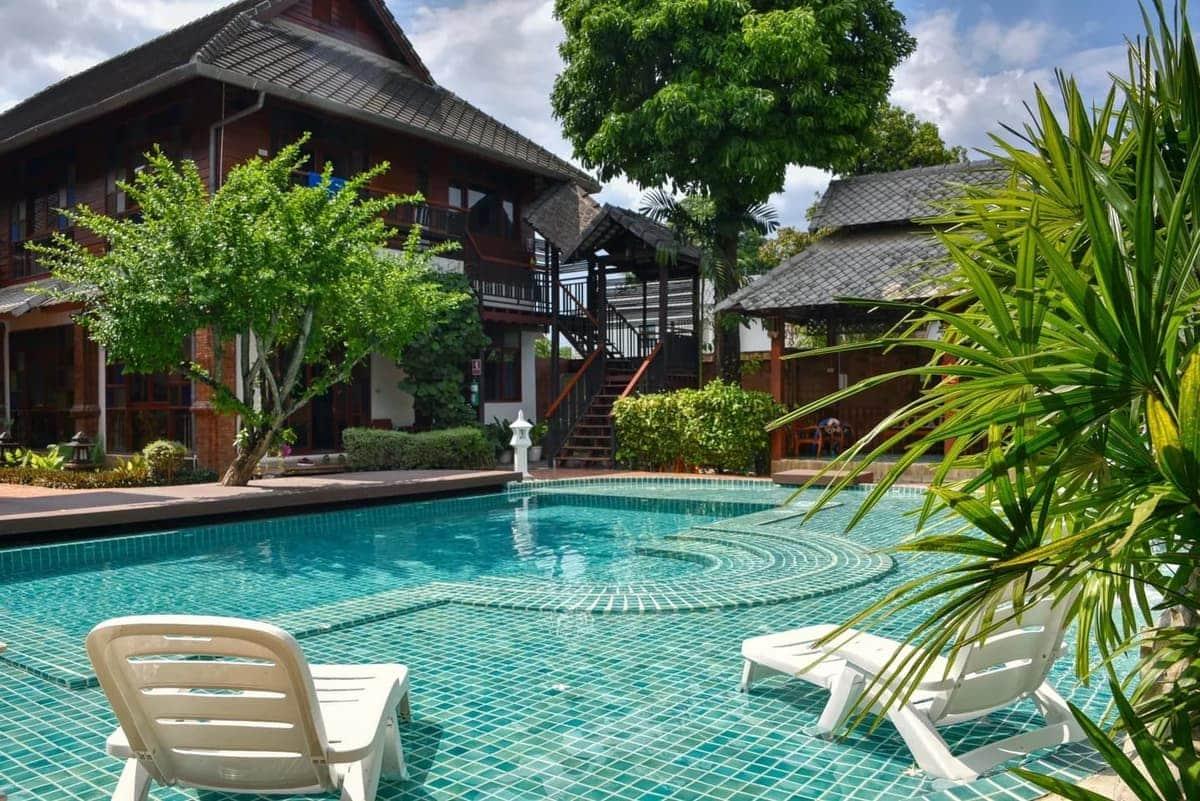 Outdoor pool with loungers at Jintara Rehab medical detox centre Chiang Mai Thailand
