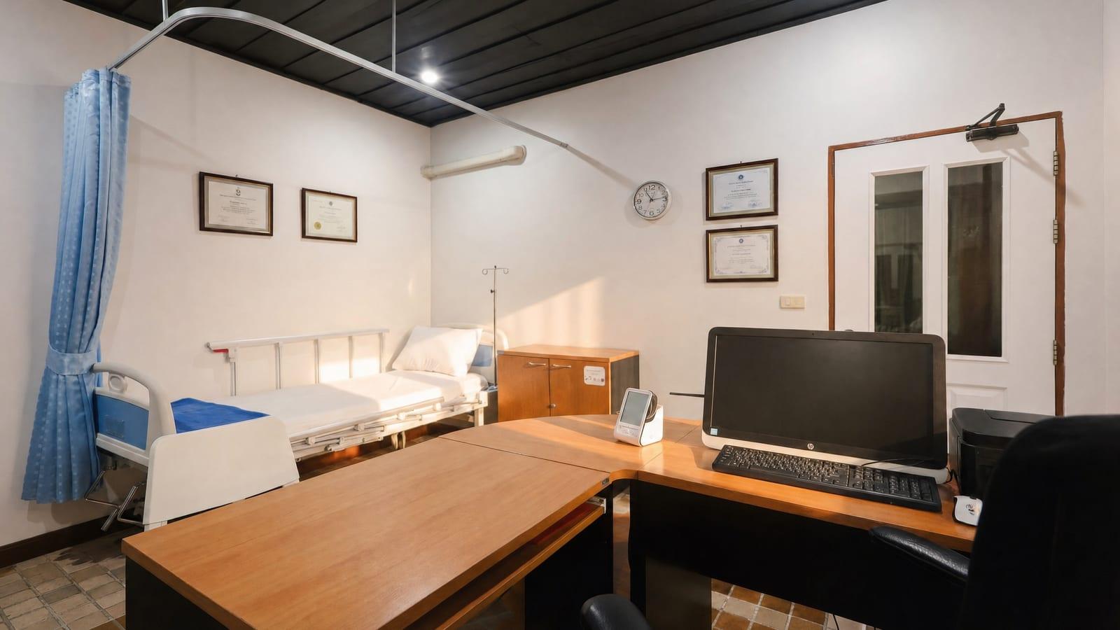 Jintara Rehab clinical medical assessment room with hospital bed and workstation in Chiang Mai