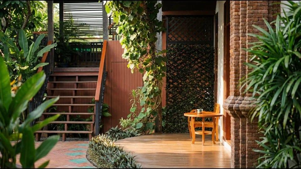 Warm morning light on the private porch at Jintara Rehab Chiang Mai, a quiet space for early recovery reflection