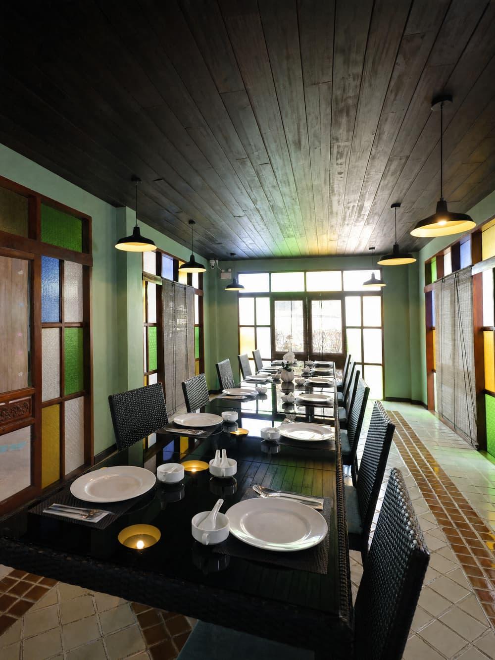 The communal dining room set for a meal at Jintara Rehab in Chiang Mai Thailand