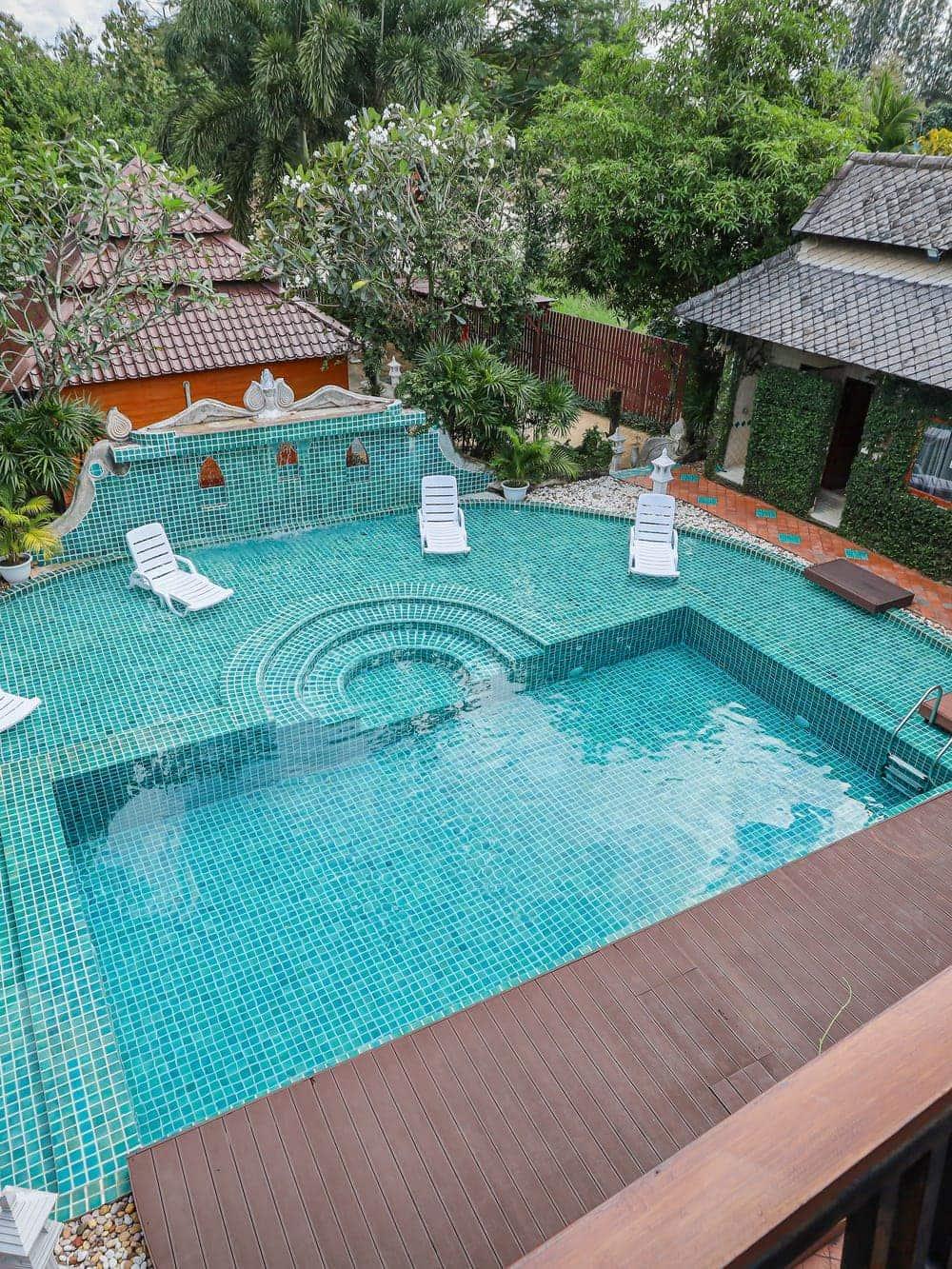 Elevated view of pool courtyard and Lanna buildings at Jintara Rehab Chiang Mai Thailand