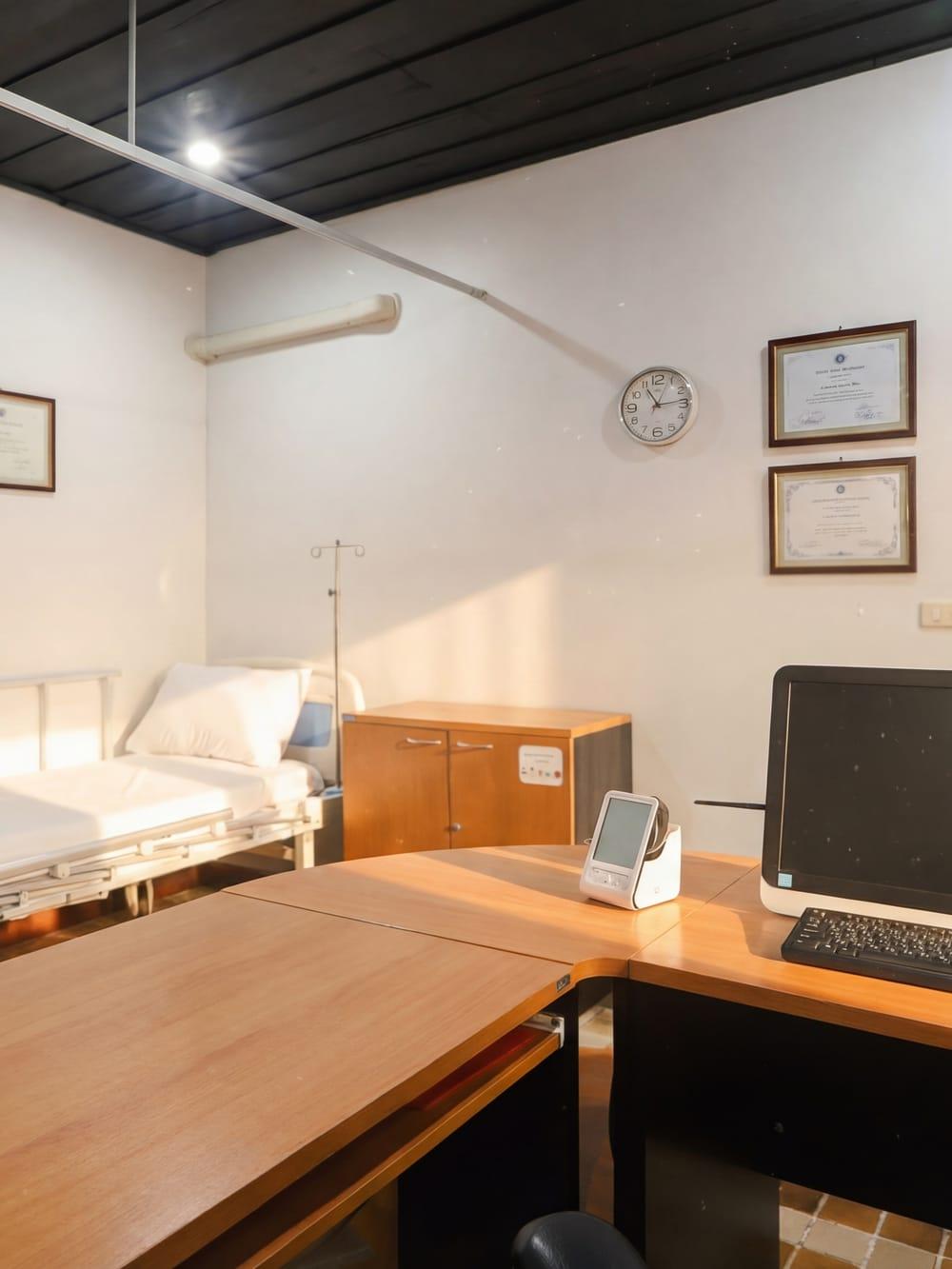 Empty medical room with clinical bed and equipment at Jintara Rehab Chiang Mai Thailand