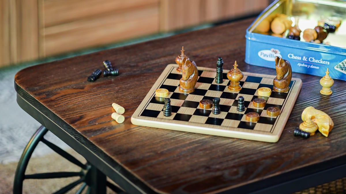 Chess pieces and a board on a lounge table at Jintara Rehab