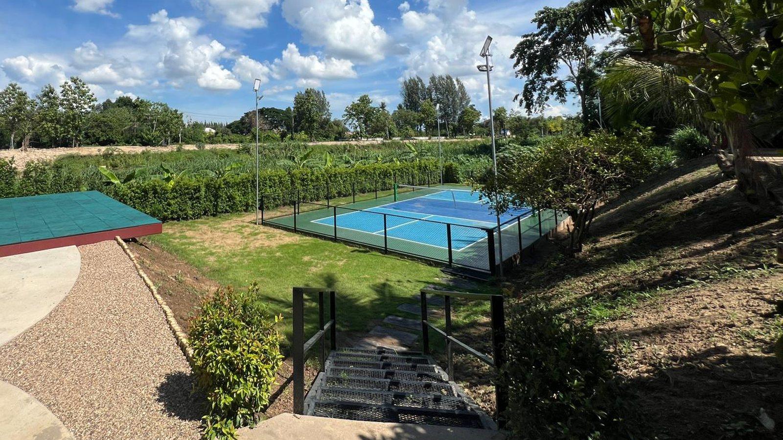 The riverside grounds and court at Jintara Rehab in Chiang Mai, an hour by air from Bangkok for anyone already in Thailand