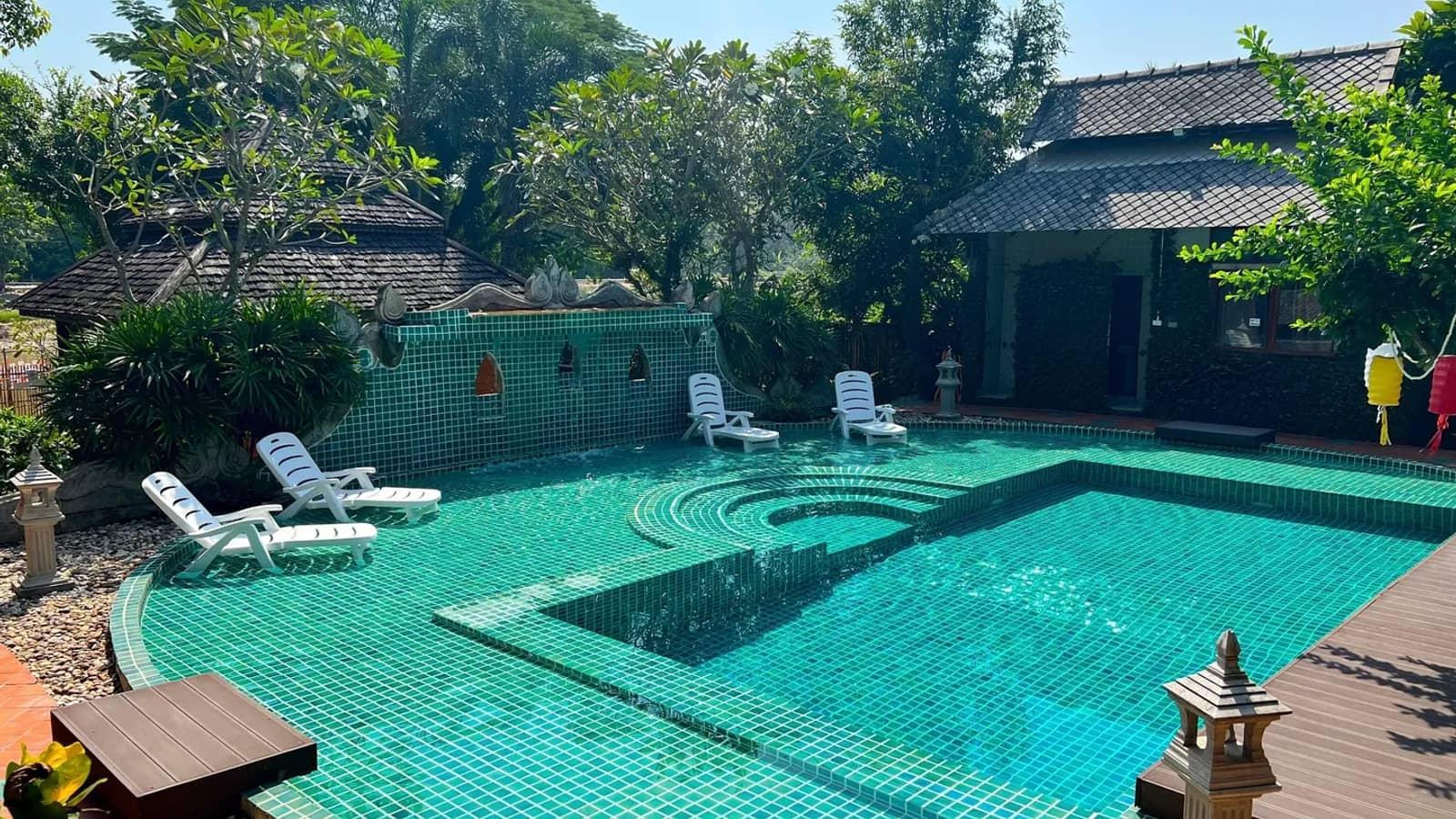 Codeine addiction treatment at Jintara Rehab Chiang Mai with pool and Lanna buildings