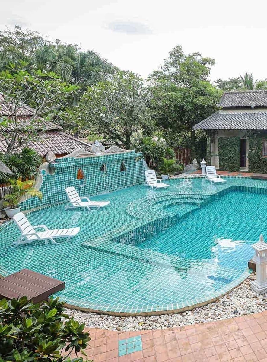 Pool and tropical gardens for fitness recovery at Jintara Rehab Chiang Mai