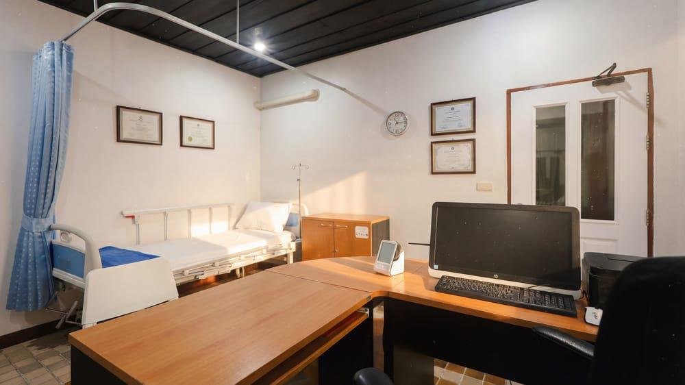 Clinical medical room with hospital bed and certifications at Jintara Rehab addiction treatment facility