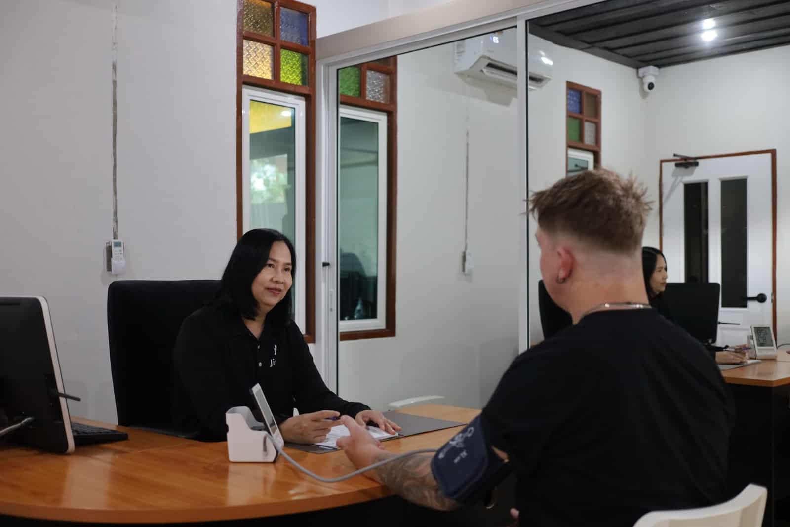 A clinical assessment taking place at a rehabilitation centre in Thailand