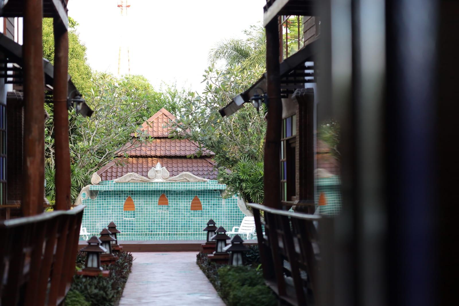 Lit compound walkway with lanterns at Jintara Rehab, residential mental health treatment facility Chiang Mai Thailand