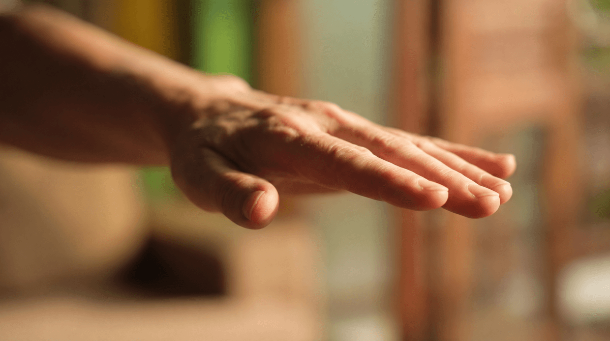 Close-up of an outstretched open hand representing EMDR therapy bilateral stimulation movement