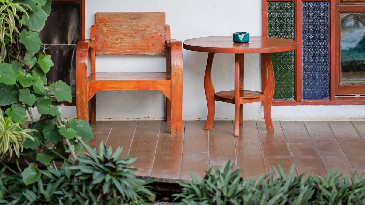 Quiet single veranda chair in tropical grounds at Jintara Rehab Chiang Mai Thailand